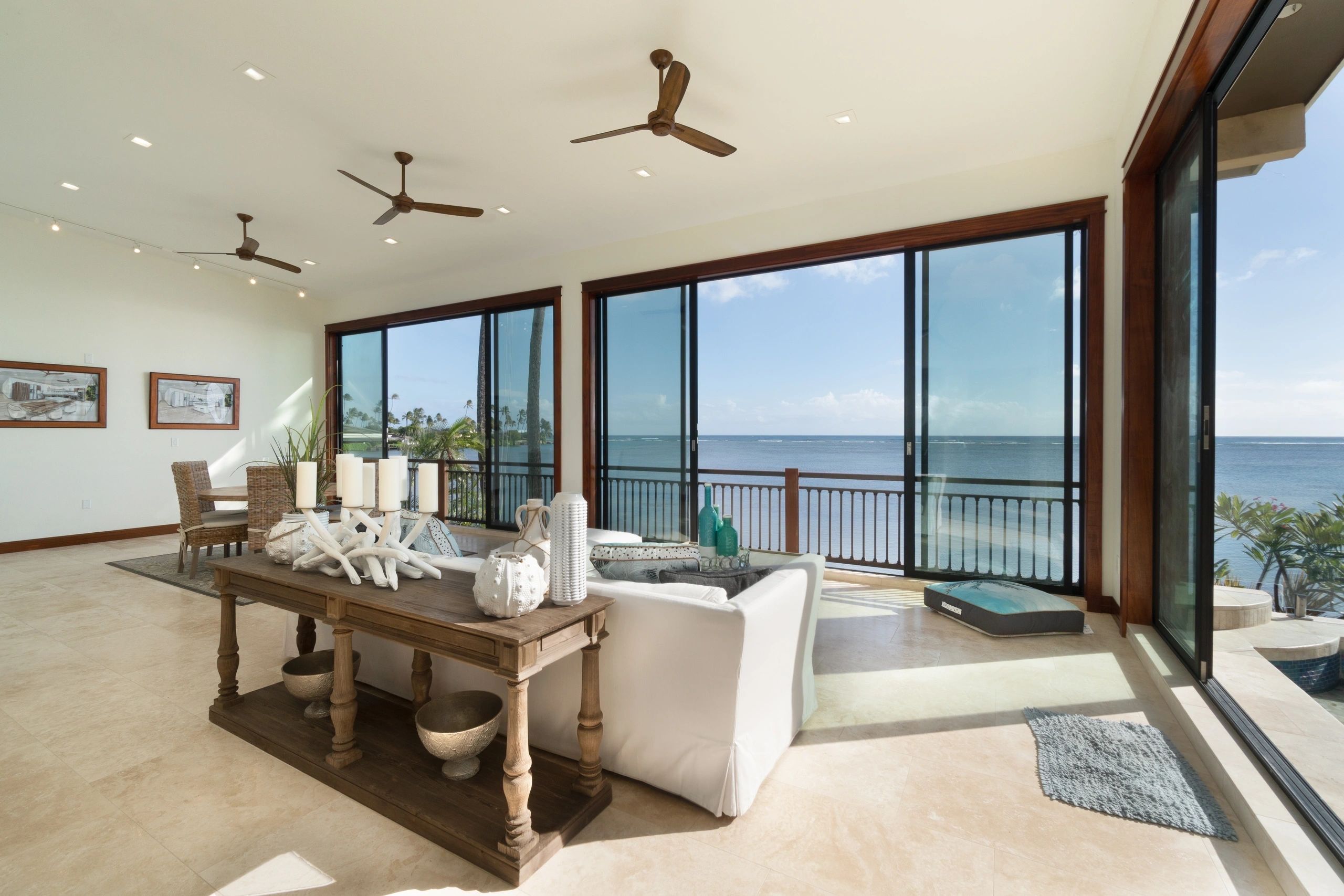 Oceanview living room with floor-to-ceiling sliding glass doors